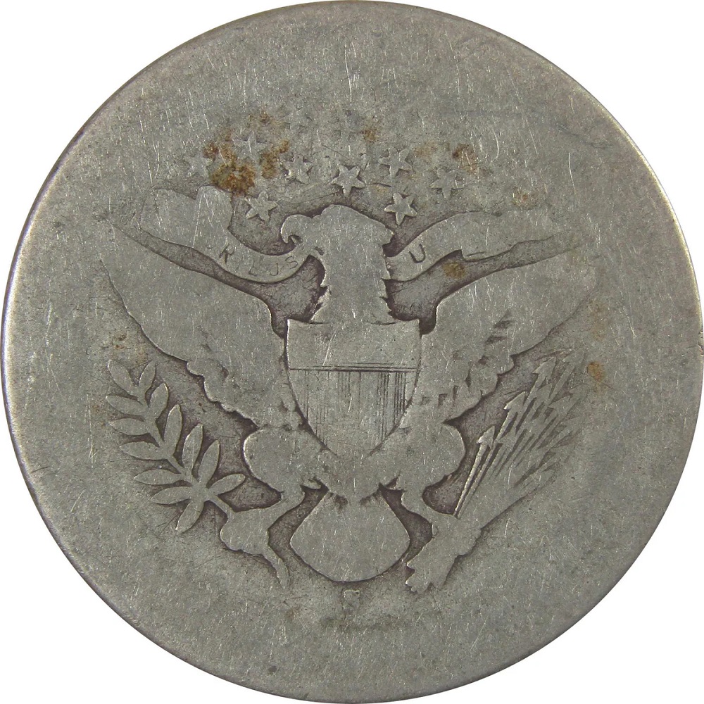 Off-center struck Barber half dollar showing partial design and blank planchet area demonstrating 15-20% off-center error